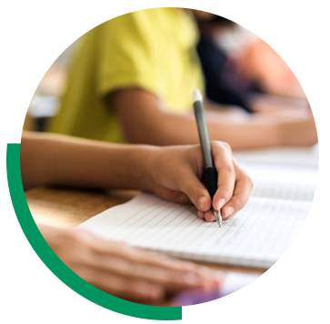 Students writing on paper